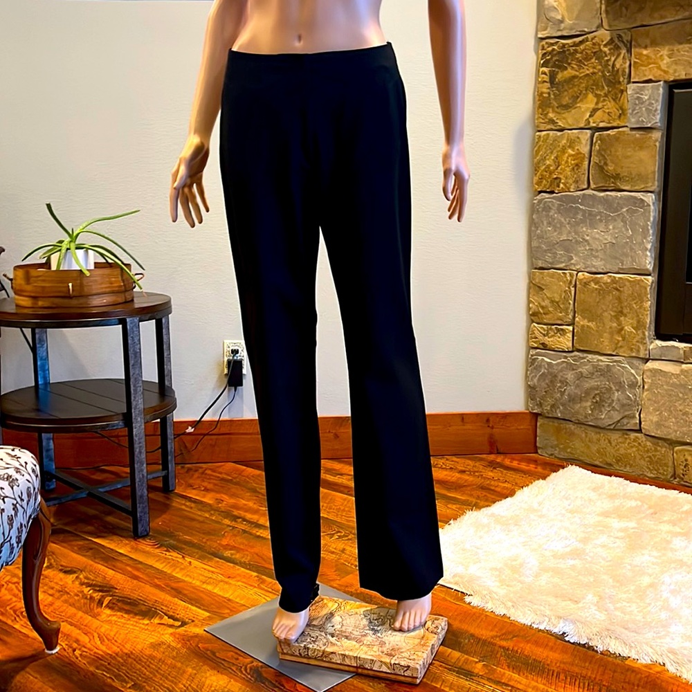 Black boot cut slacks by Vanilia. Slight stretch fabric